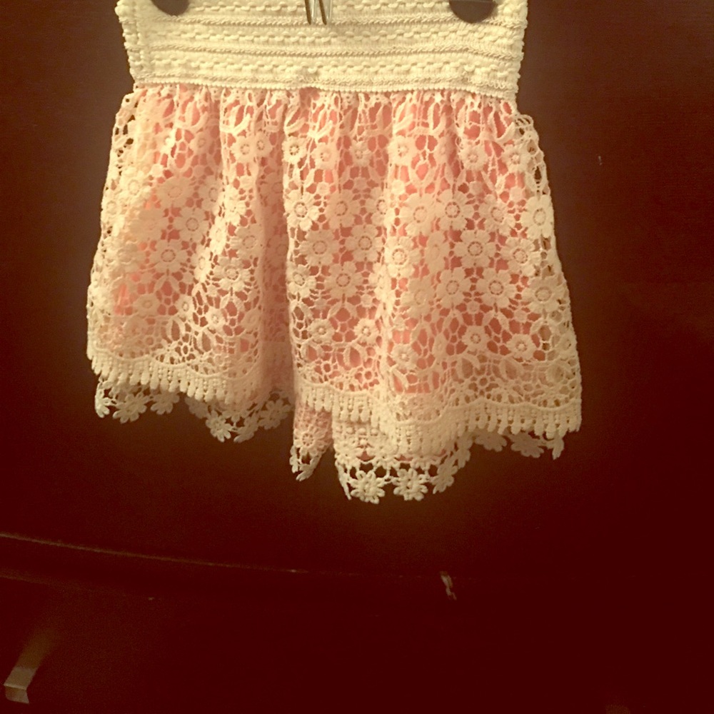 Girls peachy pink shorts with lace eyelet overlay